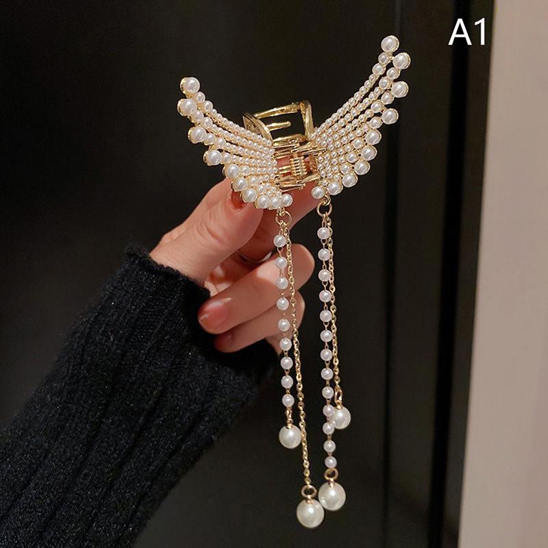 Pearl Winged Metal Clutcher Pearl Winged Metal Clutcher