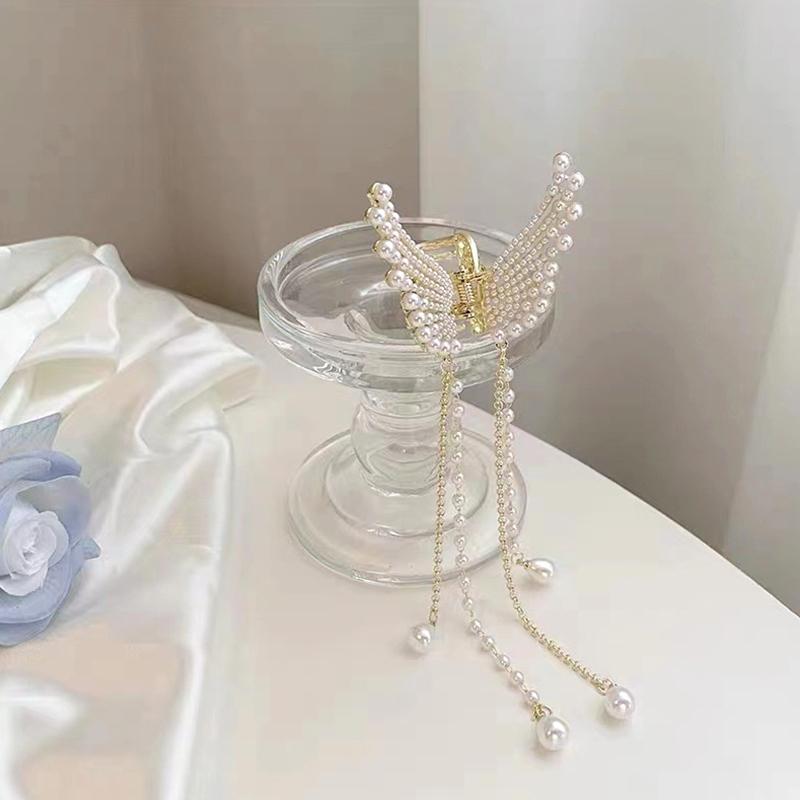 Pearl Winged Metal Clutcher Pearl Winged Metal Clutcher