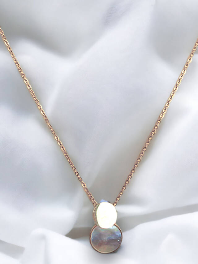 coin shaped pendant