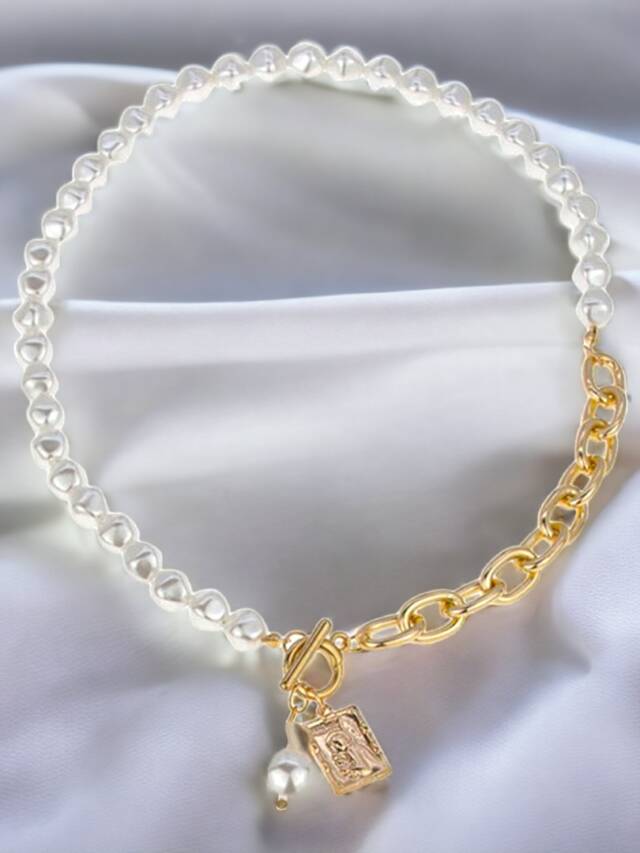 pearl necklace with key pendant